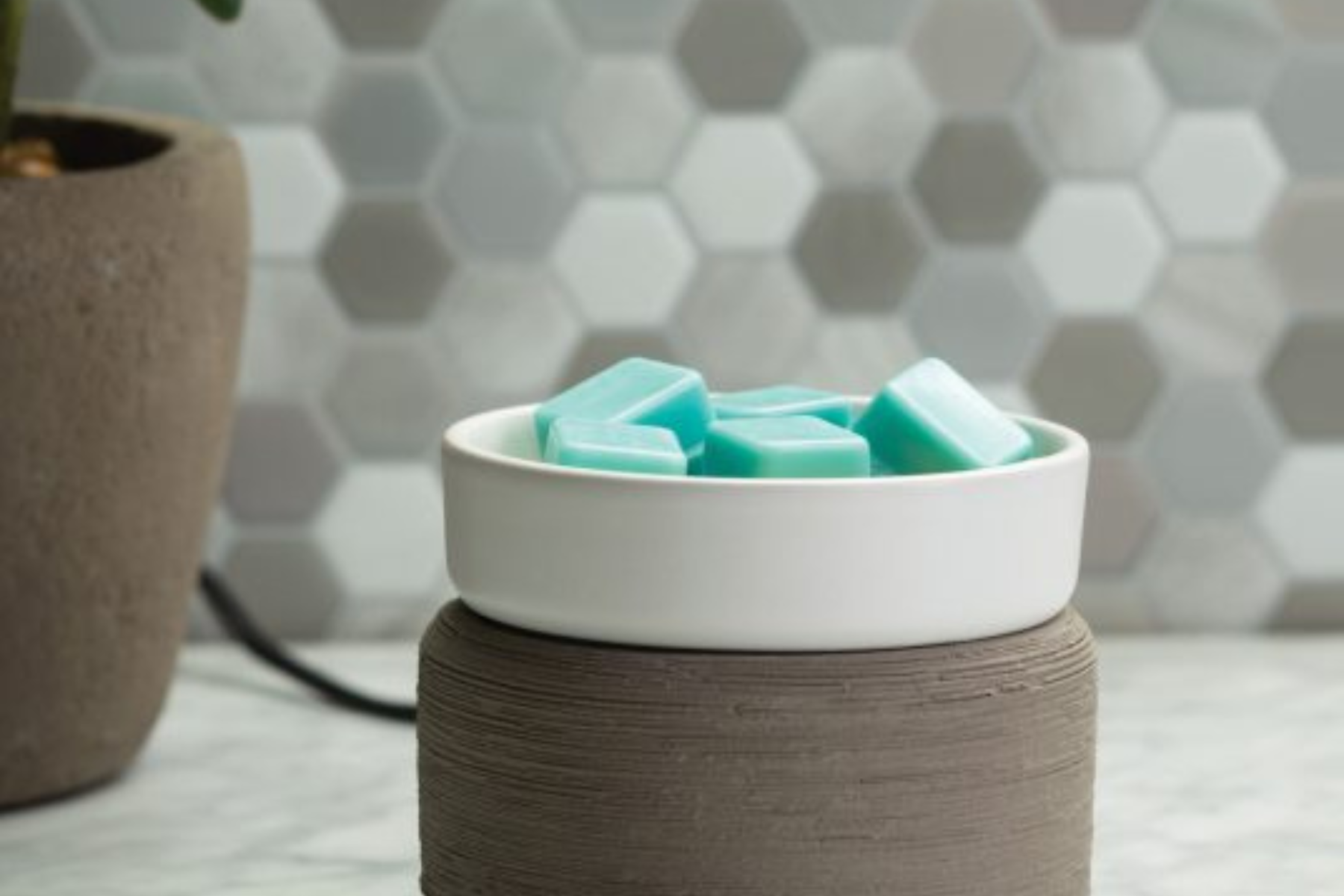 Do candle warmers evaporate wax?